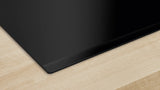 Bosch Series 4 60cm Induction Hob | 4 Cooking Zones | PowerBoost | TouchSelect Control | QuickStart & Restart | Frameless Black Glass - PIE63KBB5E