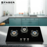 Faber 75 cm 3 Burner Gas Cooktop with Brass Burners, Manual Ignition & 8 mm Toughened Black Glass – NiOS DLX 753 BB BK